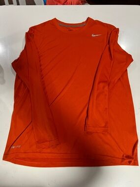 Nike Orange Long Sleeve Athletic Top with Silver Swoosh